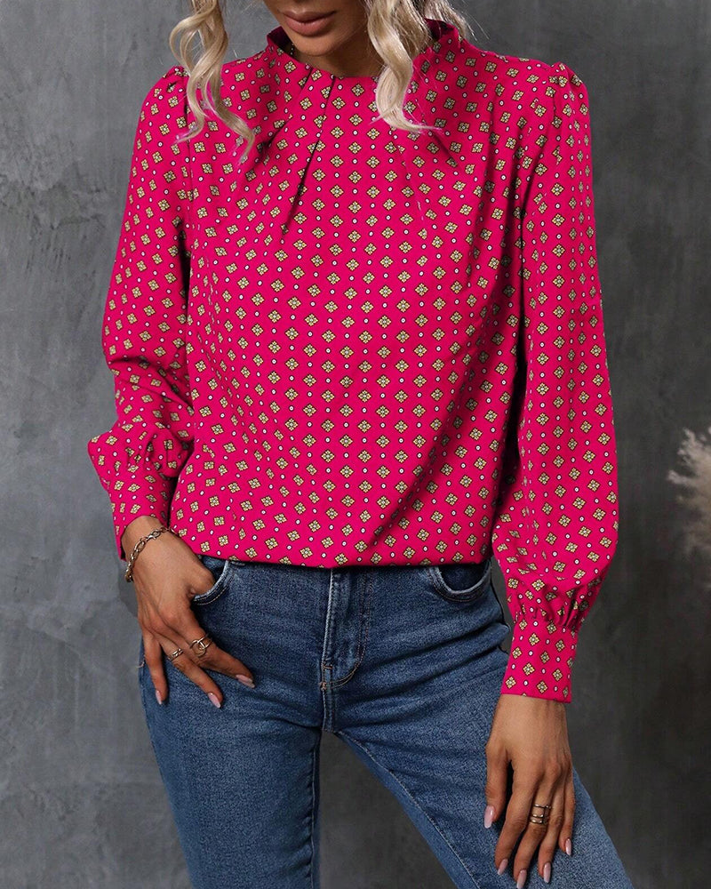 Blus med vintagestil och tryck