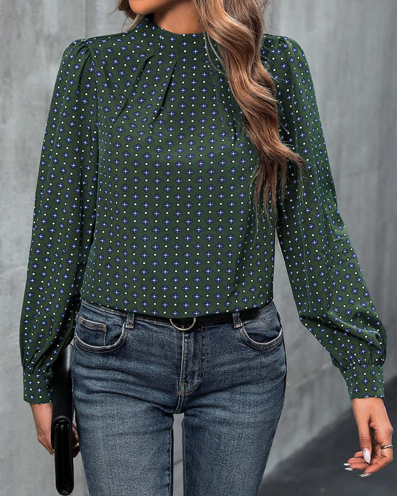 Blus med vintagestil och tryck