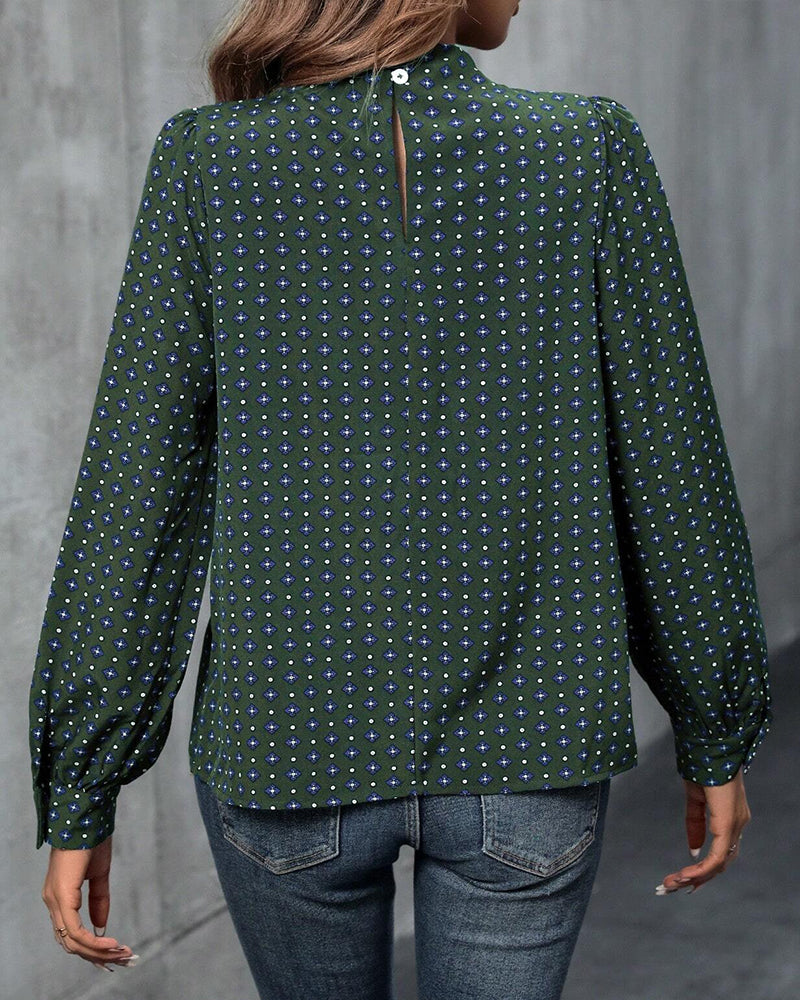 Blus med vintagestil och tryck