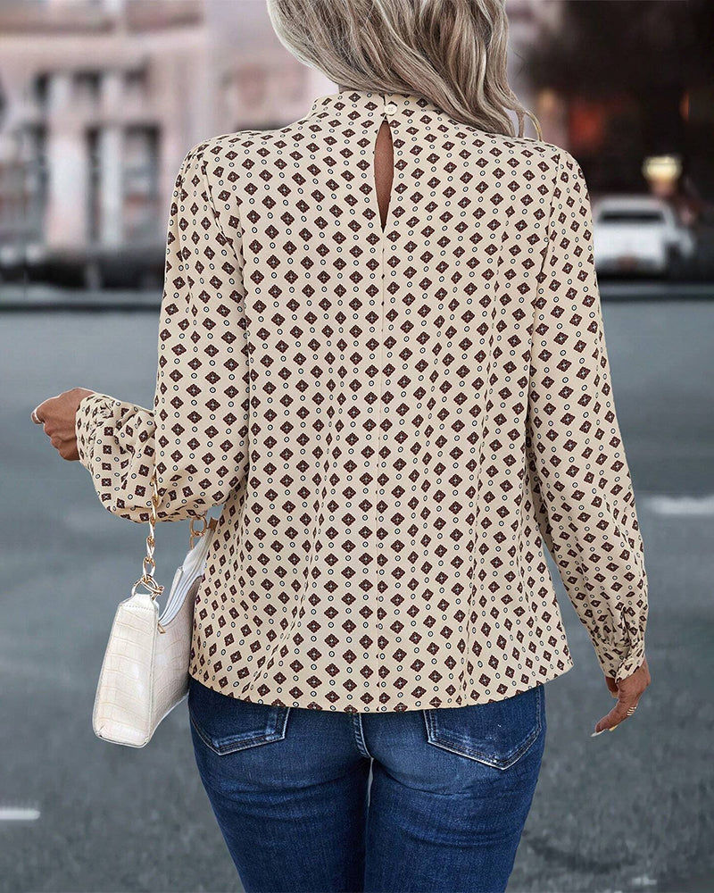 Blus med vintagestil och tryck