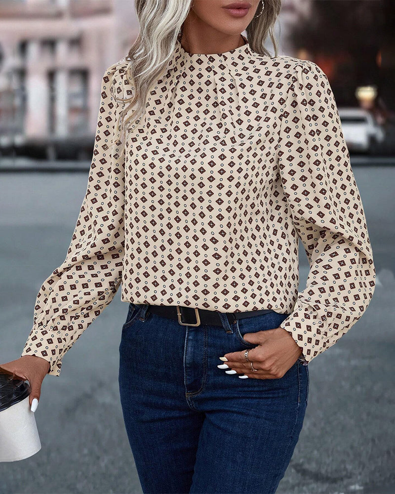 Blus med vintagestil och tryck