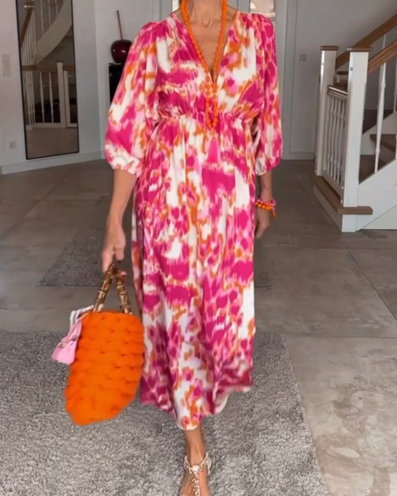 V-ringad modetryck klänning med 3/4 ärm