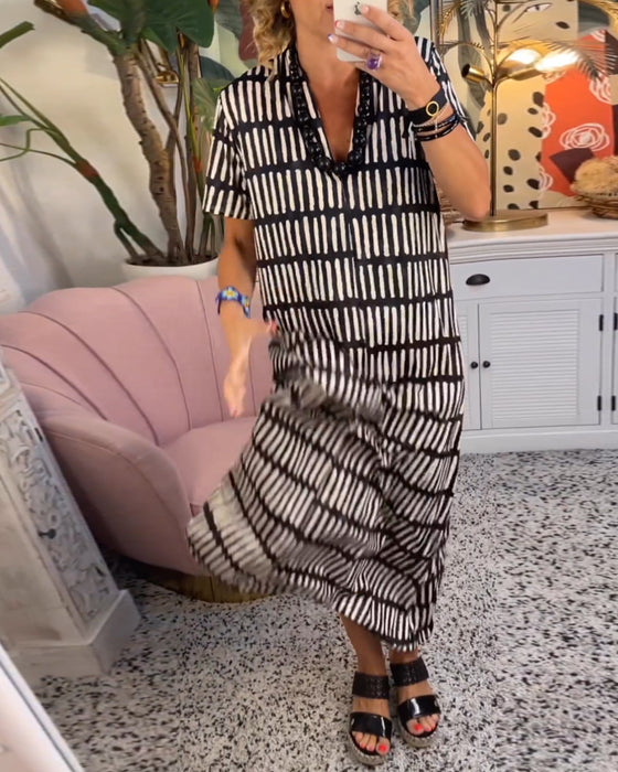 Tryckt kortärmad lång avslappnad klänning