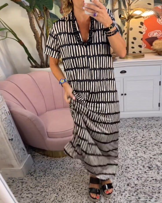 Tryckt kortärmad lång avslappnad klänning