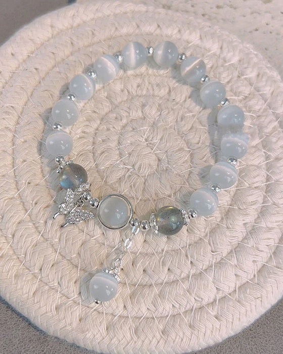 Imiterande kattögonkristallfjärilssmycke