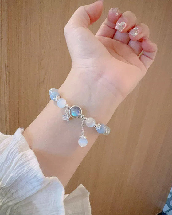 Imiterande kattögonkristallfjärilssmycke