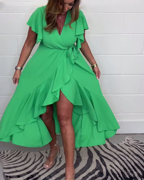 Volang elegant klänning i enfärgad slits