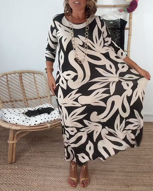 Klänning Med Rund Hals Och Långa Ärmar Med Tryck