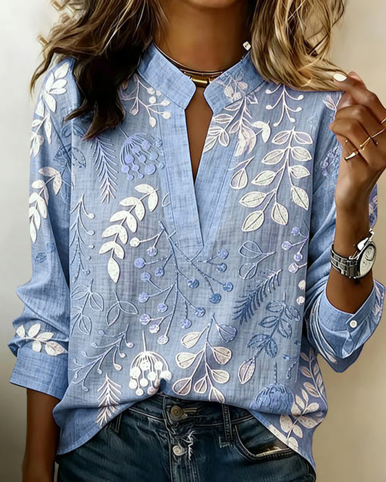 Blus Med Blommigt Mönster Och Ståkrage