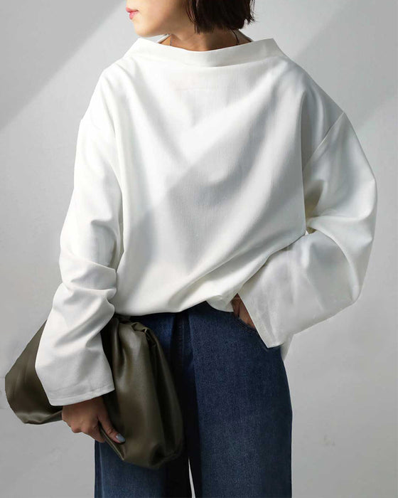 Blus med lös passform och långa ärmar