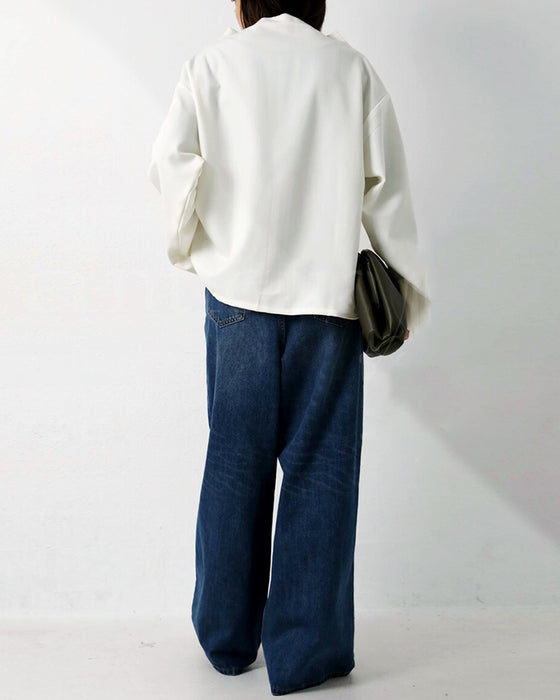 Blus med lös passform och långa ärmar