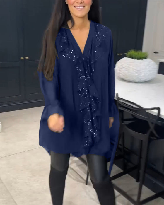 Blus med volanger och elegant stil