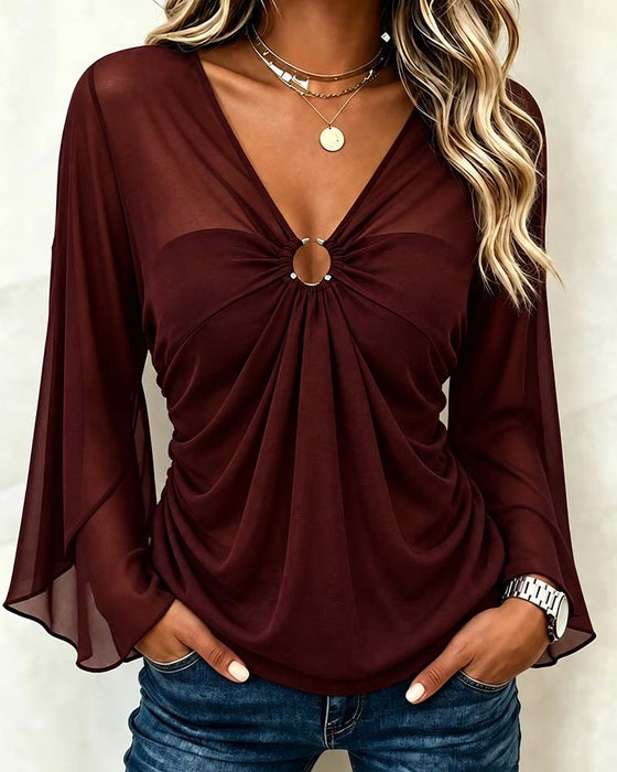 Blus V-Hals Metall Ring Twist