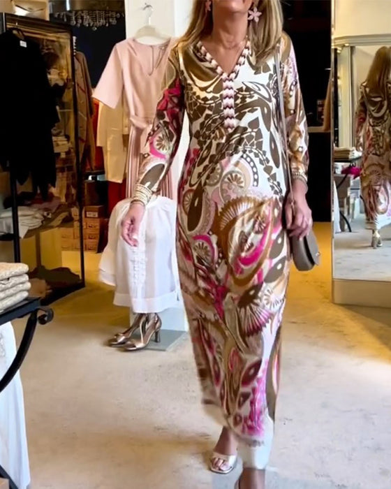 V-ringad lång klänning med tryck