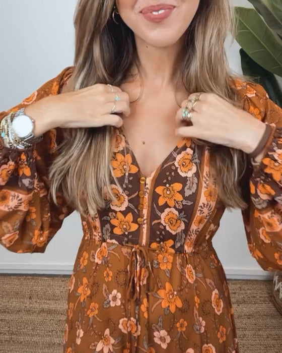 Vintage blommig klänning med V-ringad lanternärm