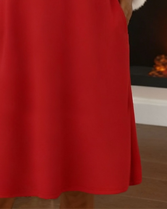 Klänning Med Lurvig Kontrast Och V-Ringning