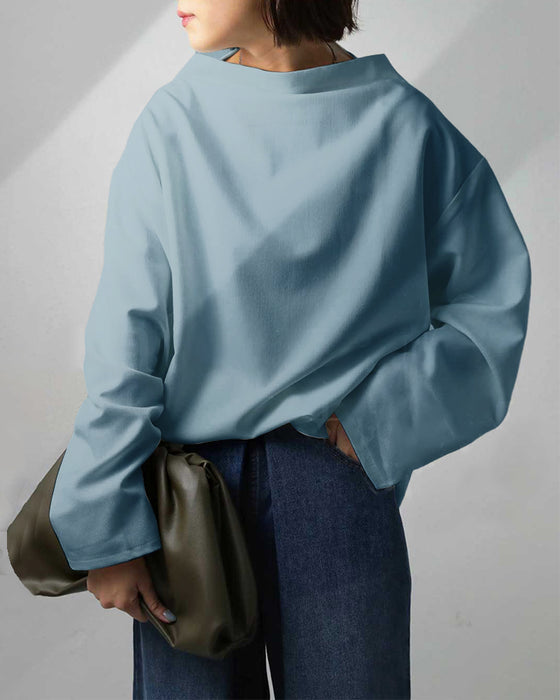 Blus med lös passform och långa ärmar