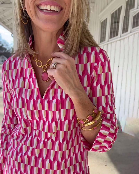 Tryckt topp med stativkrage och nio fjärdedels ärm