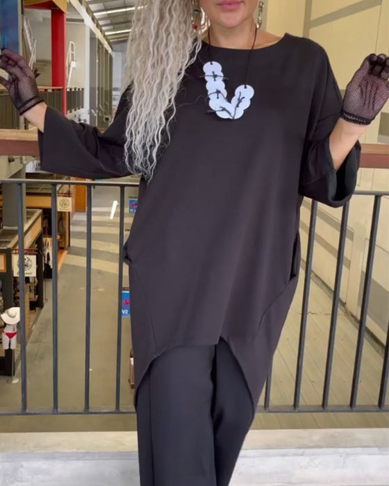 Topp med lös passform och långa ärmar