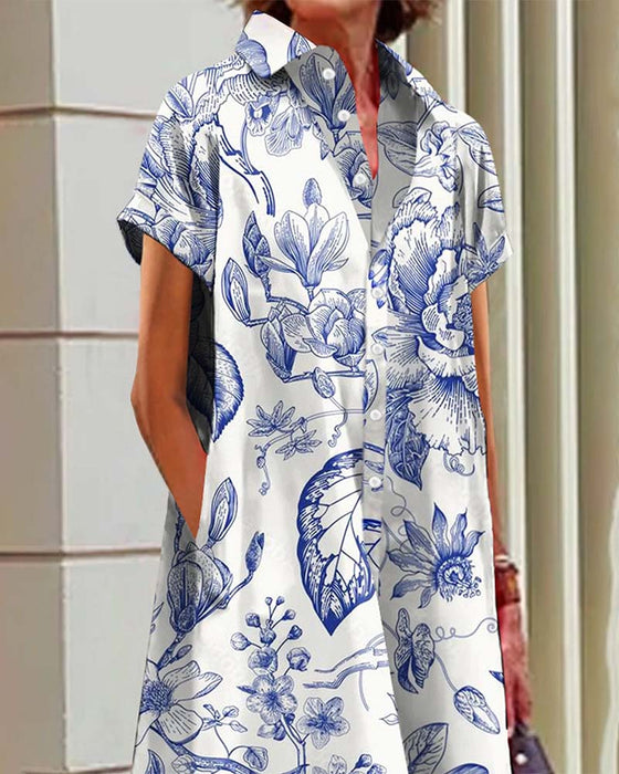 Avslappnad elegant tryckt klänning med lapelfickor