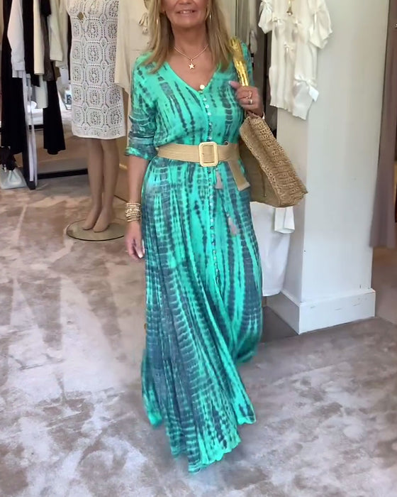 Tryckt V-ringad maxiklänning med knappar