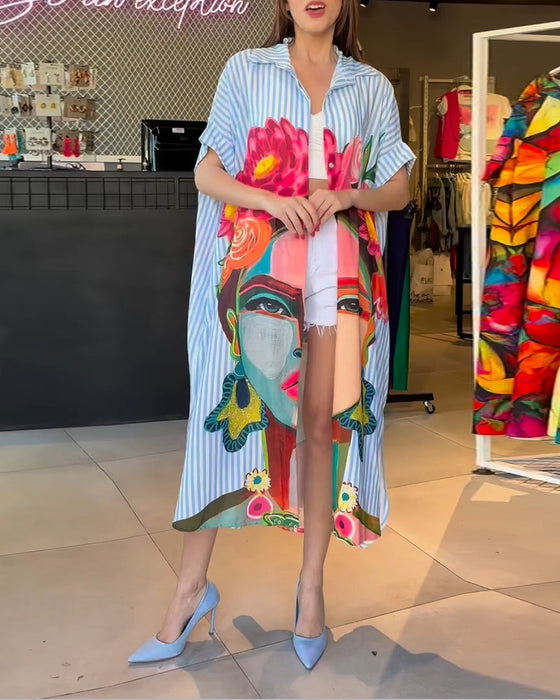 Vertikal randig blus med karaktärstryck i lapel