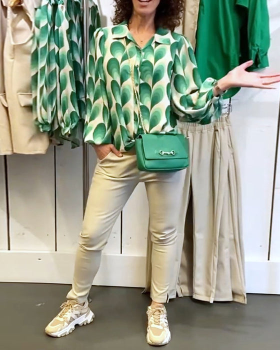 Blus med slag och tryck