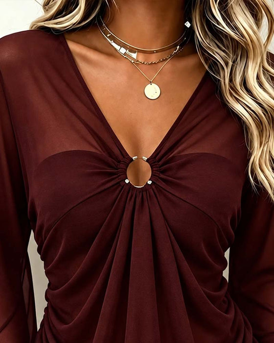 Blus V-Hals Metall Ring Twist