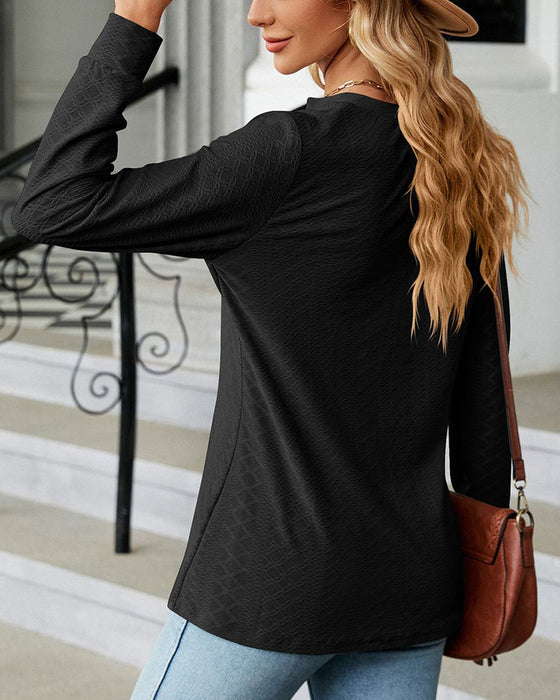 V-ringad enfärgad topp