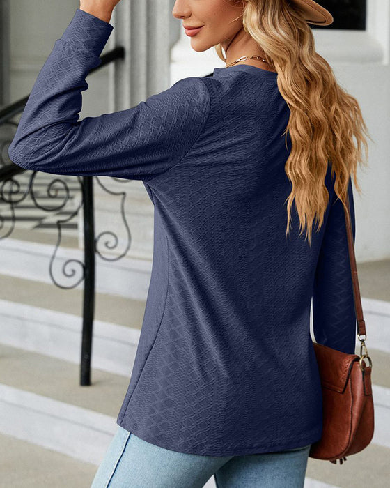 V-ringad enfärgad topp