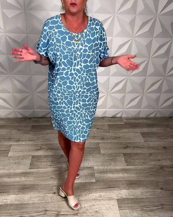 Klänning avslappnad med tryck och rund halsringning