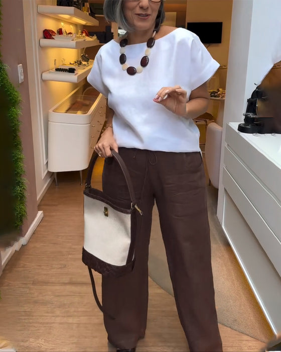 Vidsträckta Byxor Med En Färg, Relaxad Stil Och Dragkedja