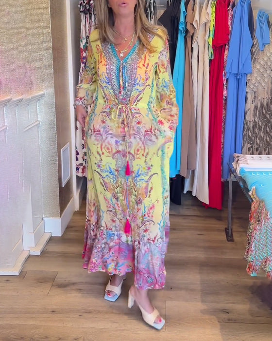 Långärmad resortklänning med tryck