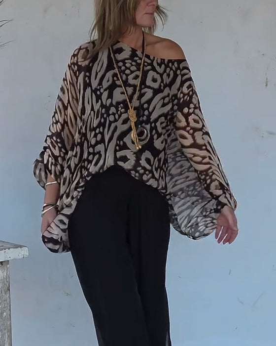 Oregelbunden Blus Med Fladdermusmönster Och Lång Ärm