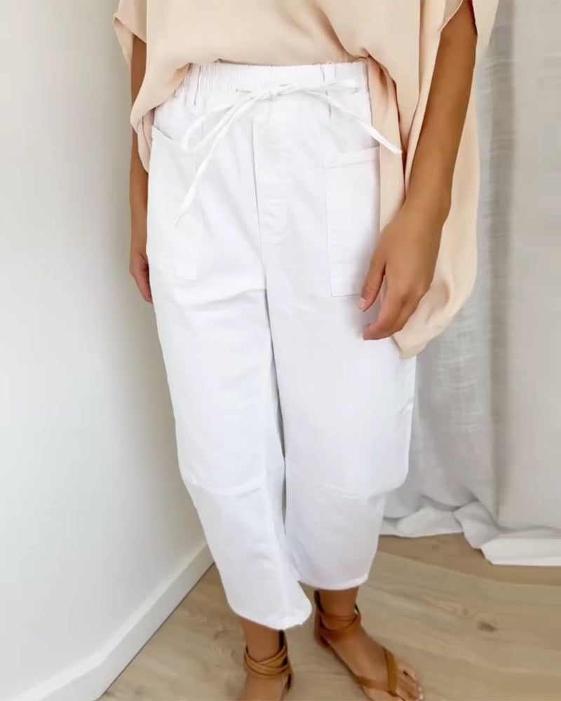 Byxor I Denim Med Fickor Och Kort Längd