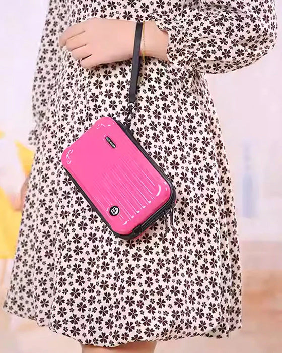 Miniatyrresväska som korsväska