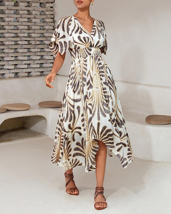 Tryckt V-ringad oregelbunden elegant klänning