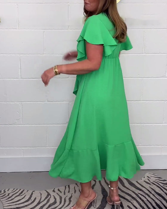 Volang elegant klänning i enfärgad slits