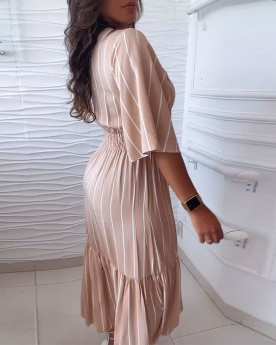 Casual klänning med dragsko i randigt tryck