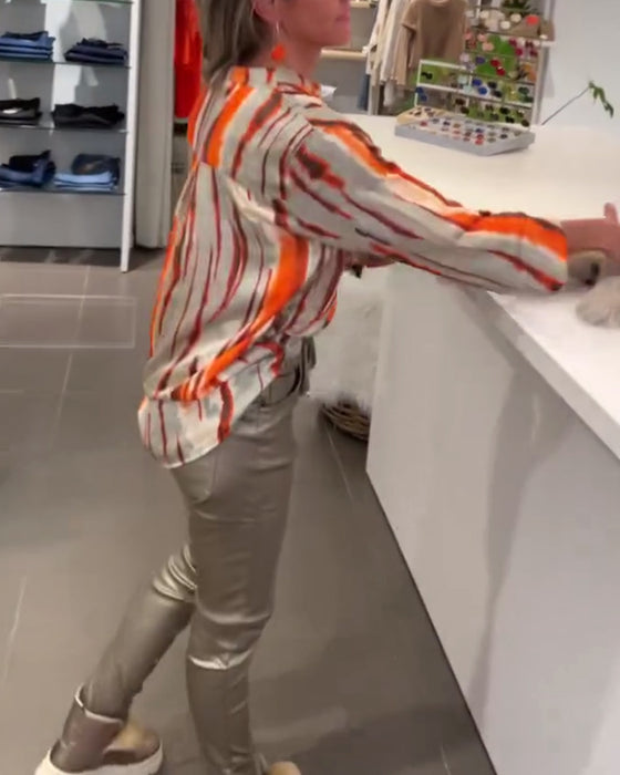 Långärmad blus med randigt tryck