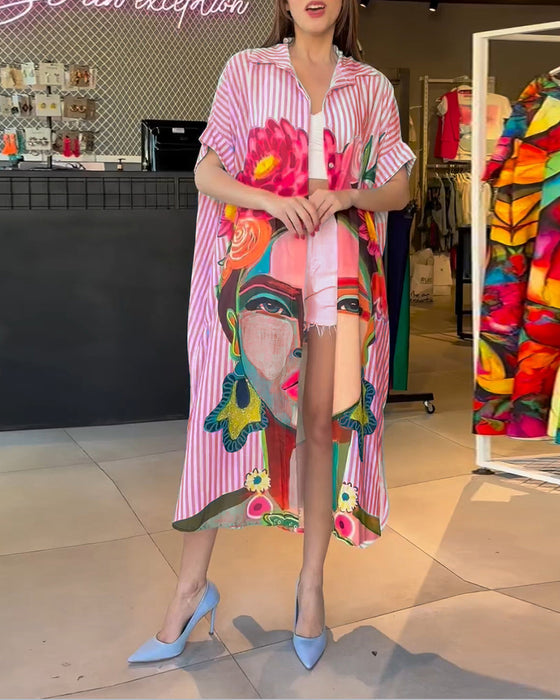 Vertikal randig blus med karaktärstryck i lapel