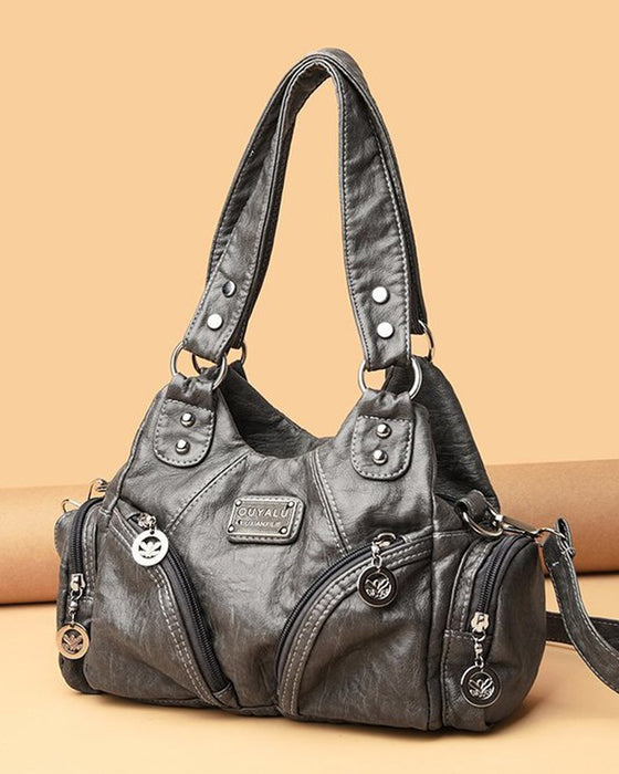 Vintage mjuk läderhandväska och budbärarväska.