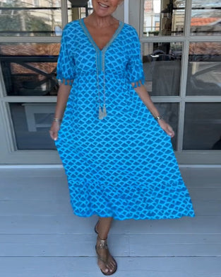 V-ringad ledig klänning med tryck