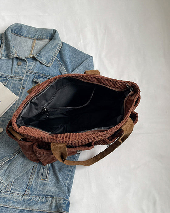 Enfärgad manchesterväska