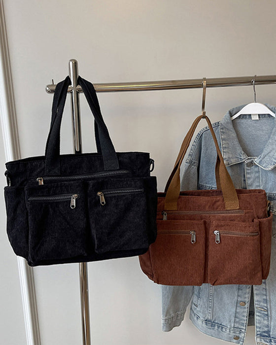 Enfärgad manchesterväska