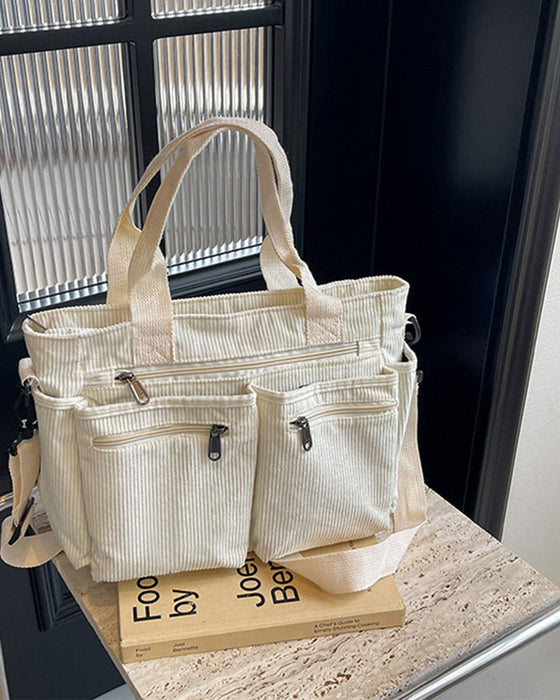 Enfärgad manchesterväska