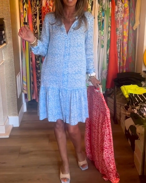 V-ringad klänning med blommönster