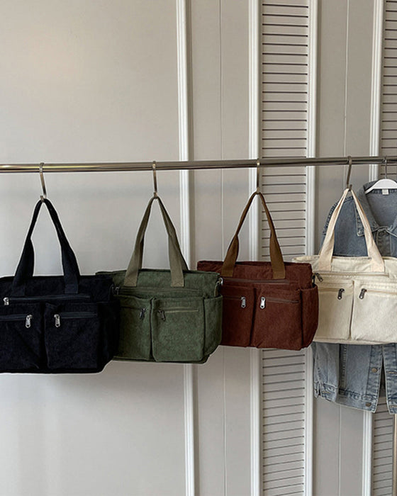 Enfärgad manchesterväska