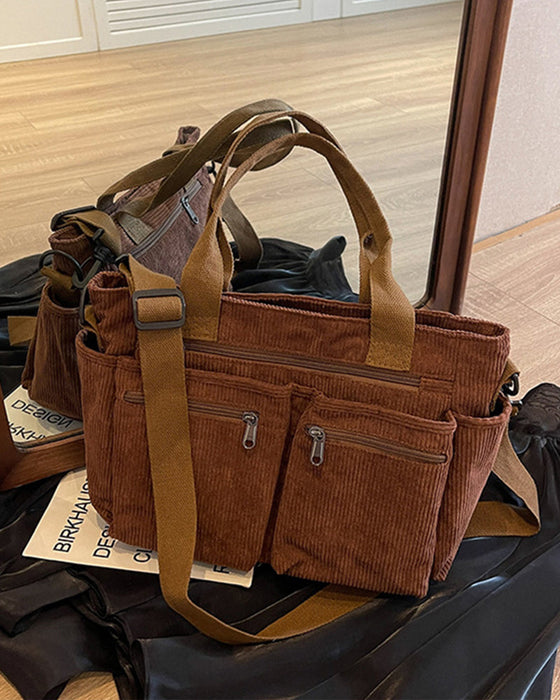 Enfärgad manchesterväska