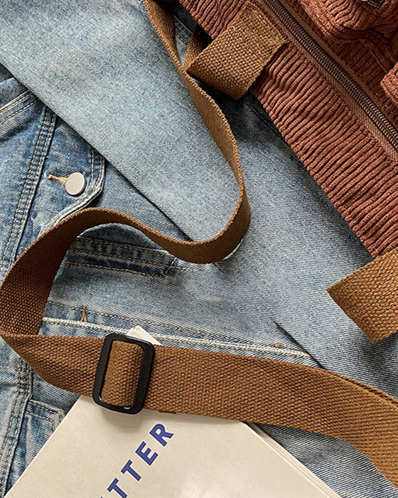 Enfärgad manchesterväska